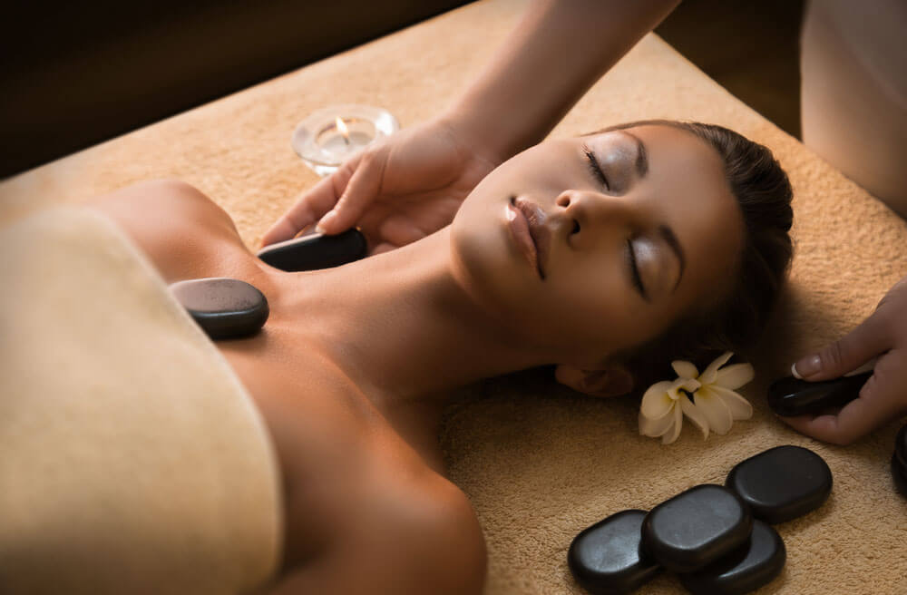 Hot Stone Massage  Day Spa u0026 Reflexology Treatments  Bliss